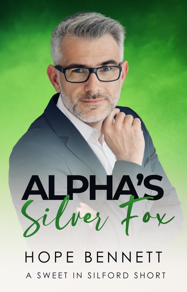 Book cover with the title 'Alpha's Silver Fox' in bold black and green. The main image is of a handsome older man with silver hair and a neatly trimmed beard. He is wearing black-framed glasses and looking pensive. The background is faded green. Other text includes the series information 'A Sweet in Silford short' and the author's name, Hope Bennett.